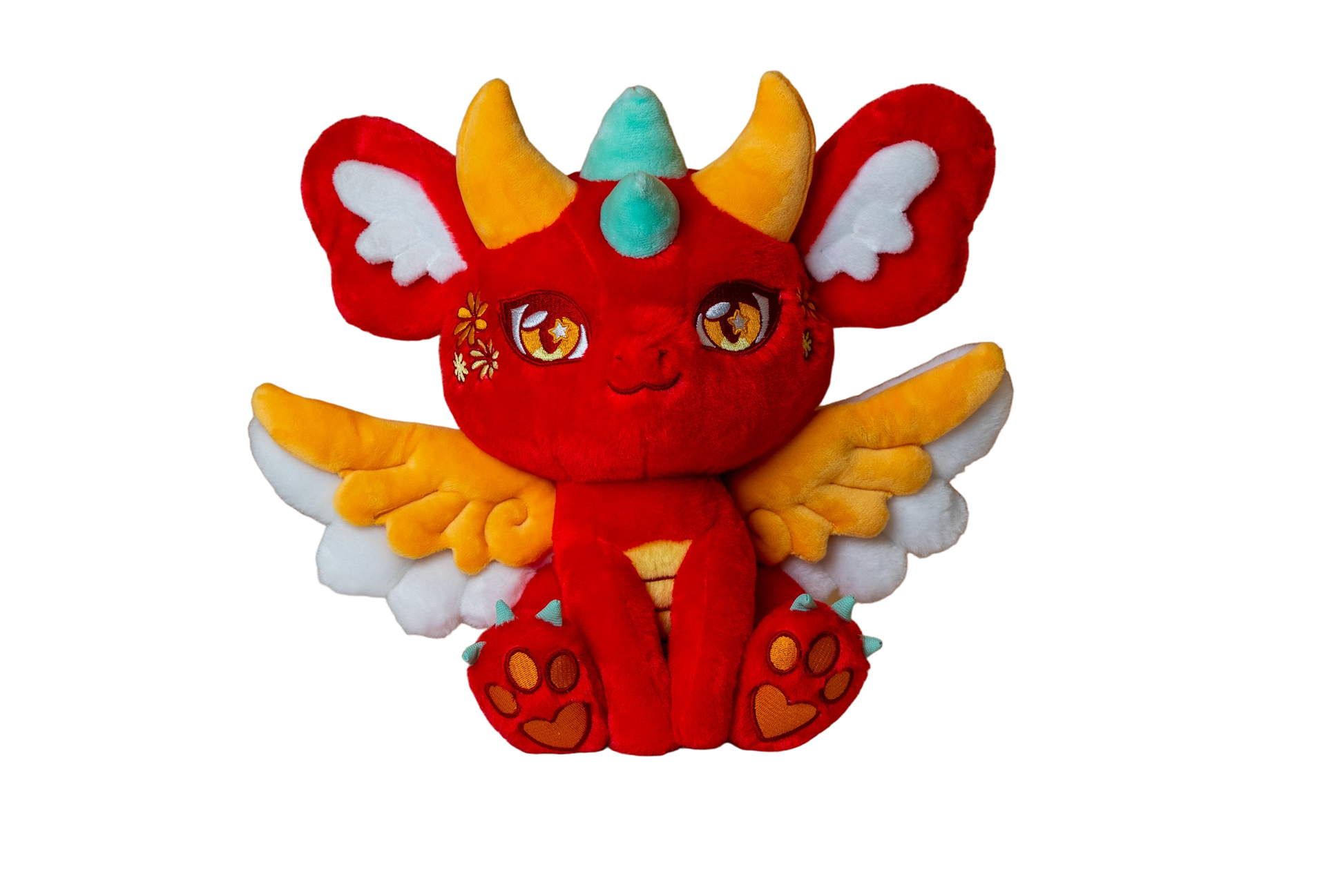 Front cutout view of Ryu, a red, orange, turquoise dragon plush.